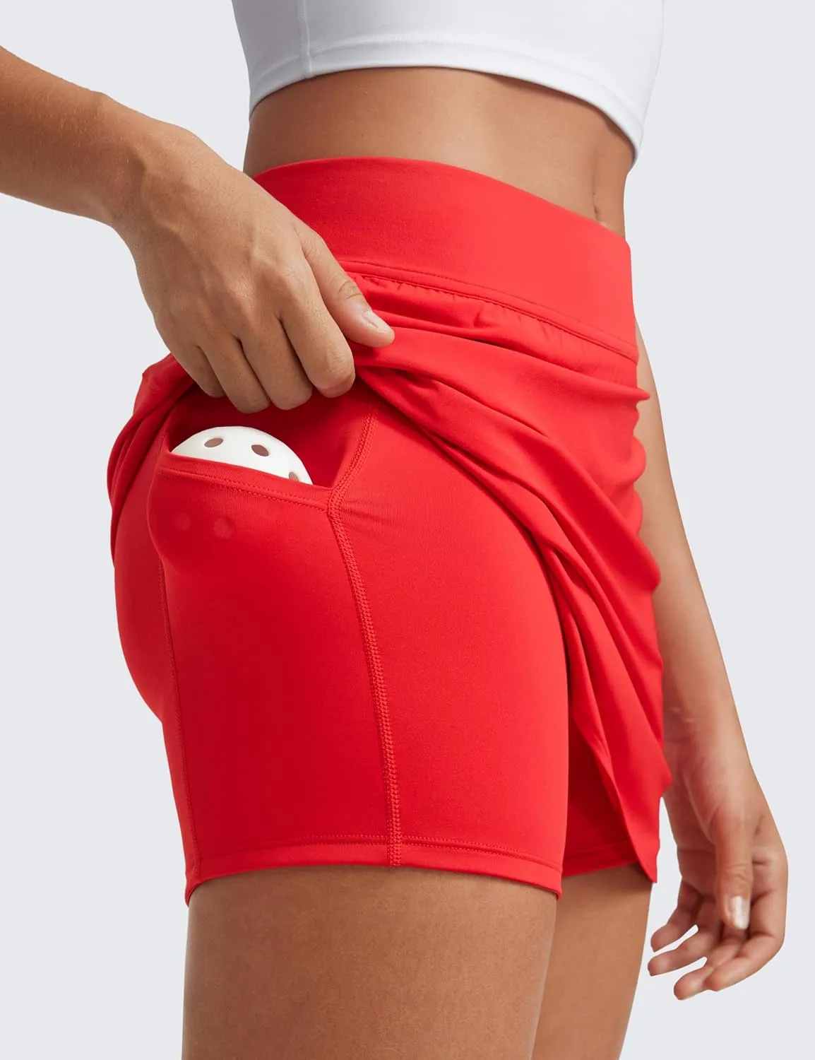 CRZ YOGA Dolphin Golf Skirts for Women A Line High Waisted Casual Athletic Mini Tennis Pickleball Skort with Zipper Pocket