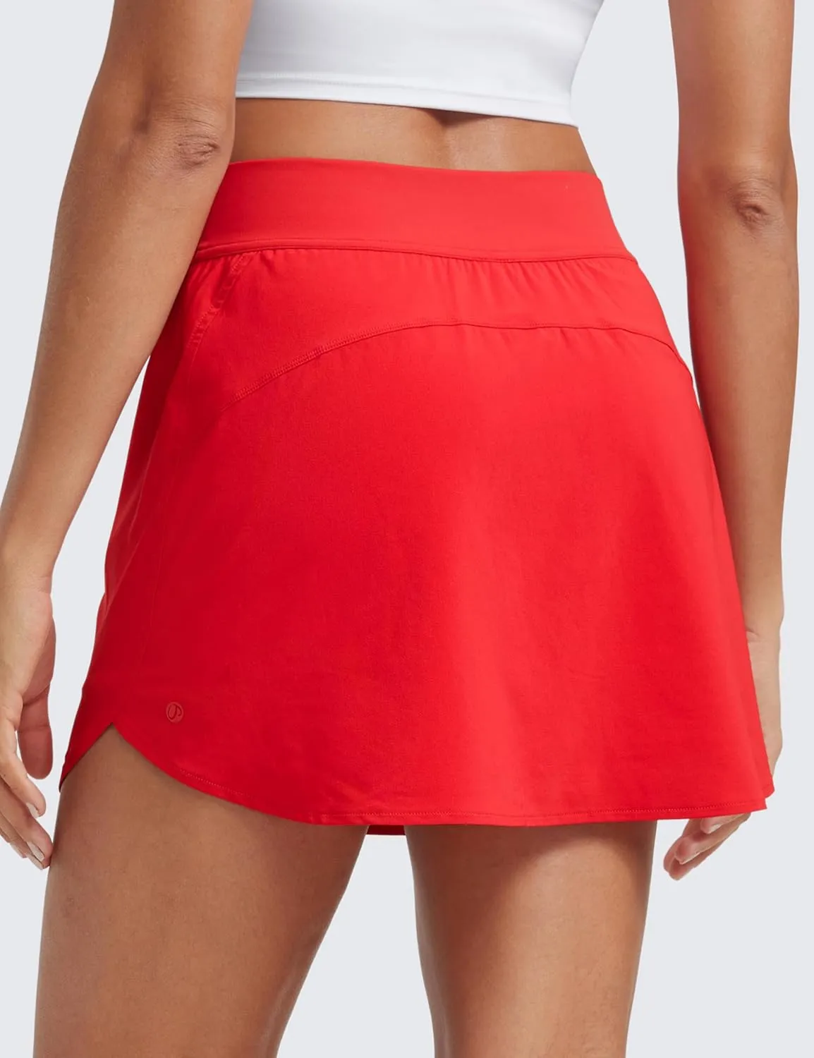 CRZ YOGA Dolphin Golf Skirts for Women A Line High Waisted Casual Athletic Mini Tennis Pickleball Skort with Zipper Pocket